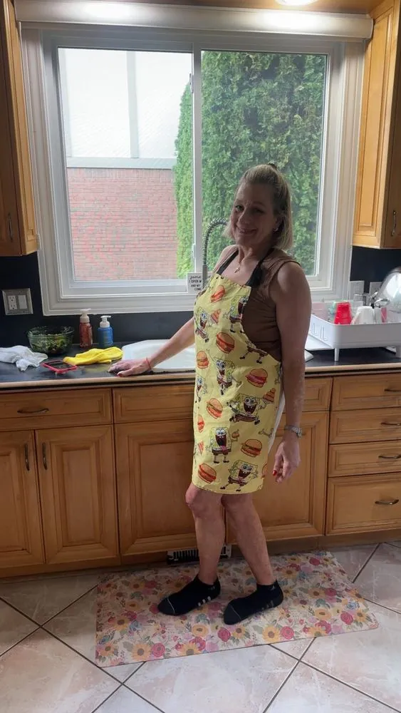 Cooking at home in a printed apron — where it all started