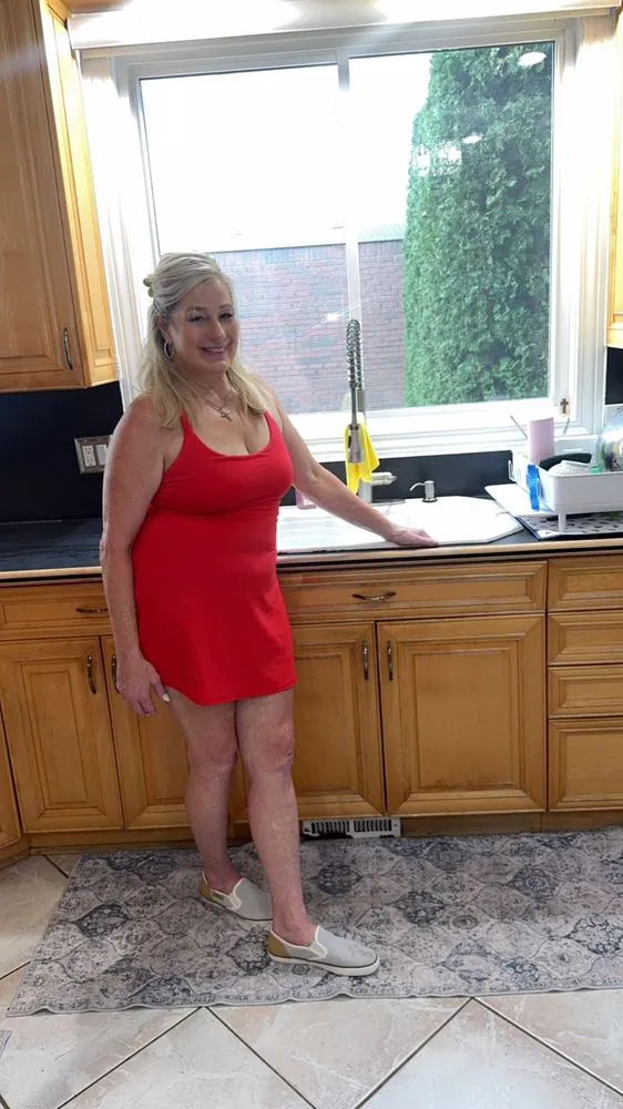 Standing in the family kitchen